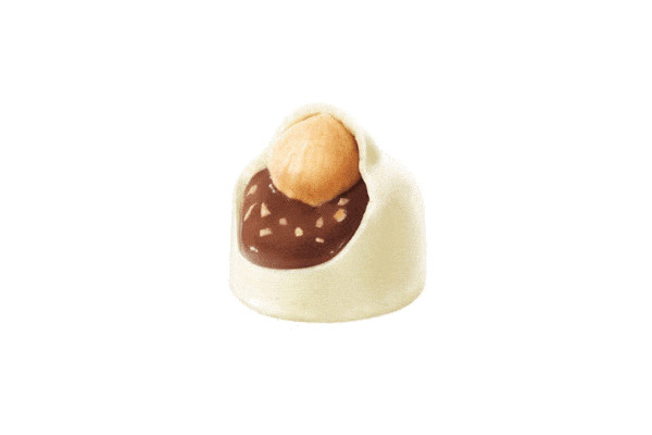 Λευκή Σοκολάτα με κομμάτια φουντουκιού.